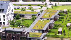Modern residential complex with green roofs